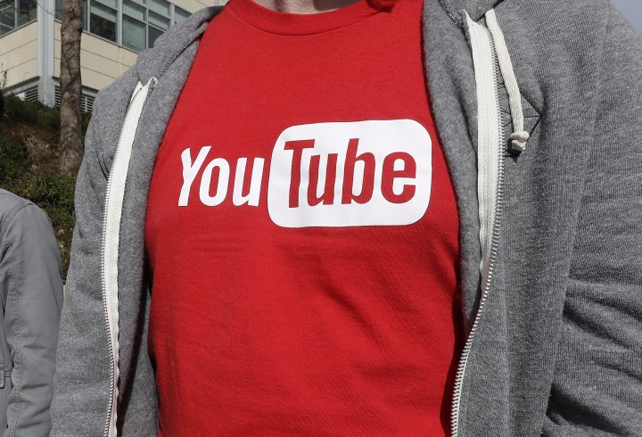 FILE - This April 4, 2018, file photo shows a YouTube logo on a t-shirt worn by a person near a YouTube office building in San Bruno, Calif. 