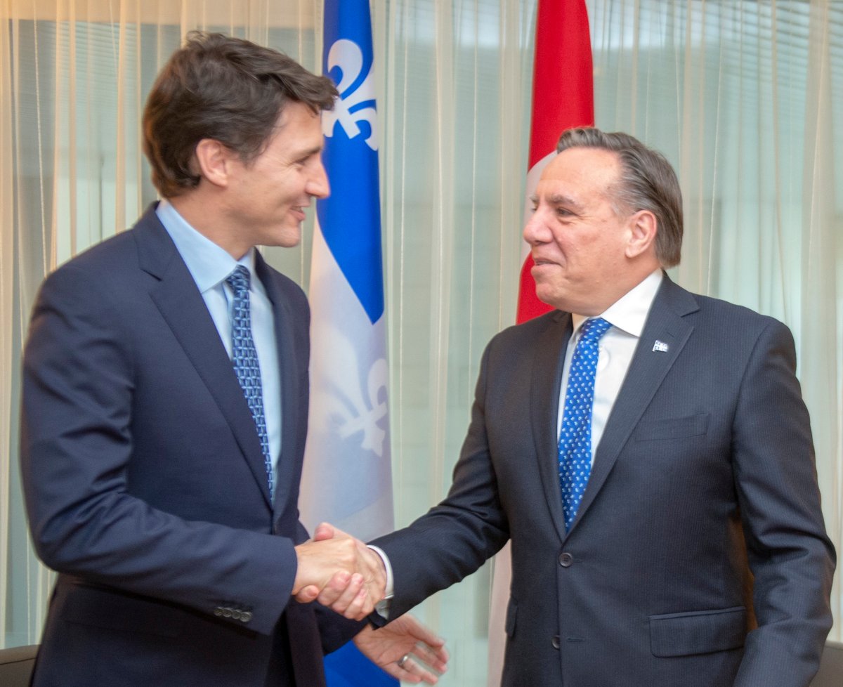 Prime Minister Justin Trudeau shakes hands with Quebec Premier François Legault before their meeting in Montreal, Friday, Dec. 13, 2019. 