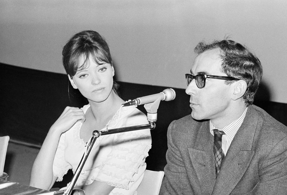 In this Aug. 31, 1965 photo, French movie director Jean Luc Godard and French actress Anna Karina are shown at the International Film Festival in Venice.
