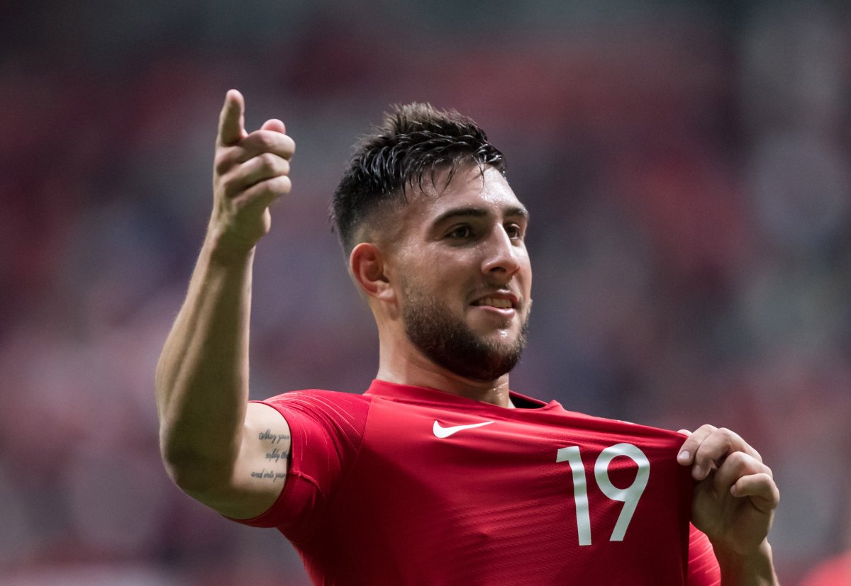 Canada's Lucas Cavallini celebrates his second goal against French Guiana during the second half of a CONCACAF Nations League qualifying soccer match in Vancouver, on Sunday March 24, 2019. The Vancouver Whitecaps have signed Canadian striker Lucas Cavallini to a three-year contract with an option for a fourth season. 