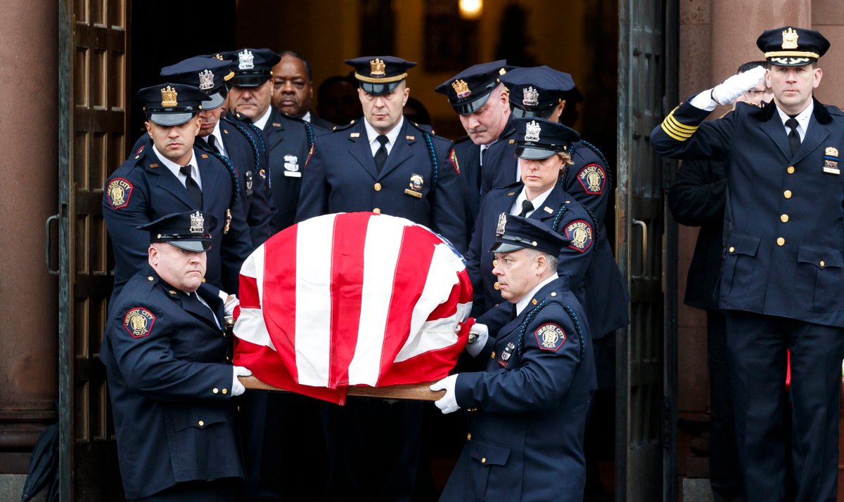Thousands gather to honour detective killed in Jersey City shooting