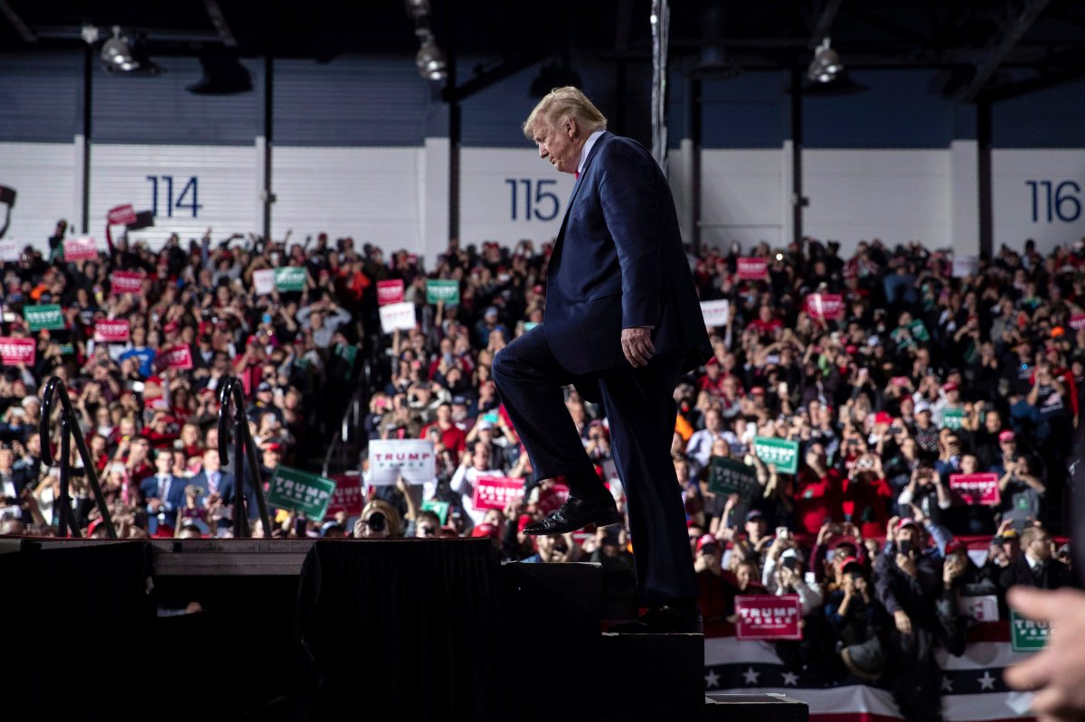 President Donald Trump arrives at W.K. Kellogg Airport to attend a campaign rally, Wednesday, Dec. 18, 2019, in Battle Creek, Mich., on the same day the House of Representatives voted to impeach him. 