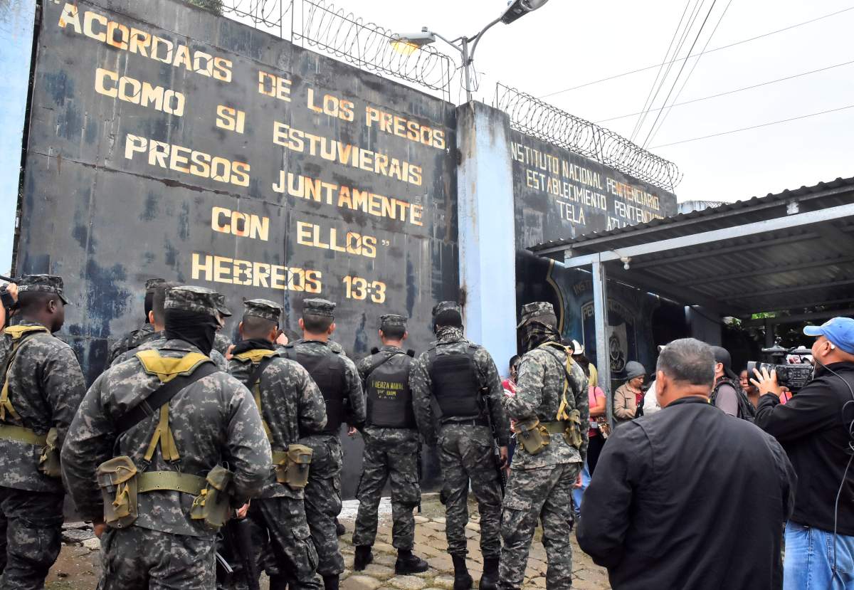 Members of the Honduran Army stand outside the Tela’s penitentiary in Atlantida, Honduras, Dec. 21, 2019.