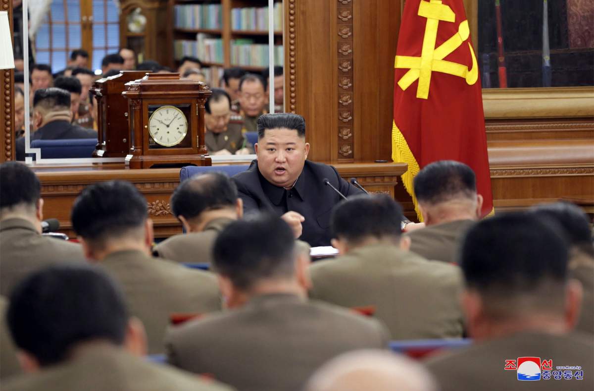 North Korean leader Kim Jong Un speaks during a ruling party meeting, North Korea on Dec. 22, 2019.