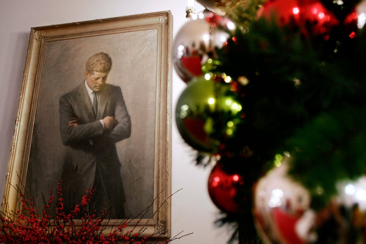 In this Nov. 30, 2006, file photo, a portrait of former President John F. Kennedy, framed by Christmas decorations, hangs in the White House in Washington.