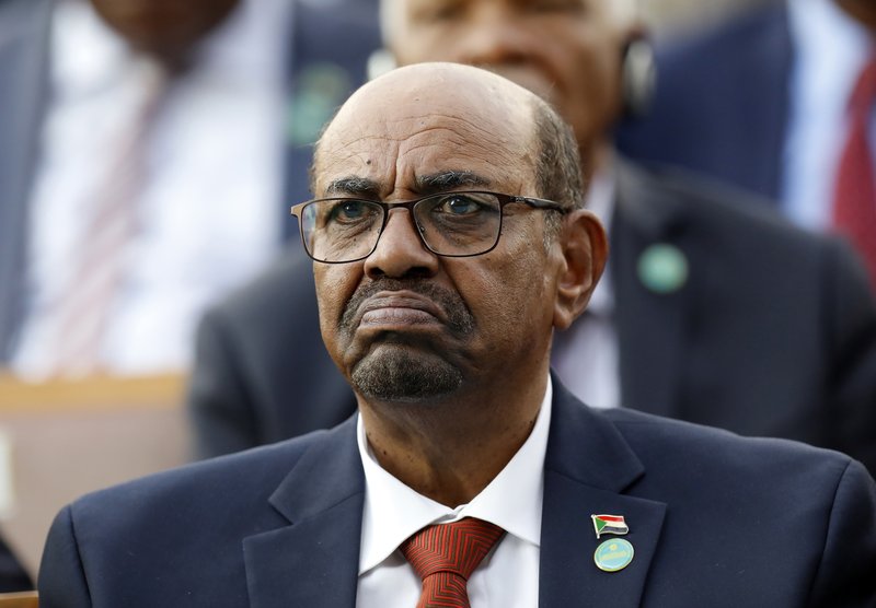FILE - In this July 9, 2018, file photo, Sudan's President Omar al-Bashir attends a ceremony for Turkey's President Recep Tayyip Erdogan, at the Presidential Palace in Ankara, Turkey. On Saturday, Dec. 14, 2019, a Sudan court convicted al-Bashir of money laundering, sentences him to 2 years in rehabilitation facility. 
