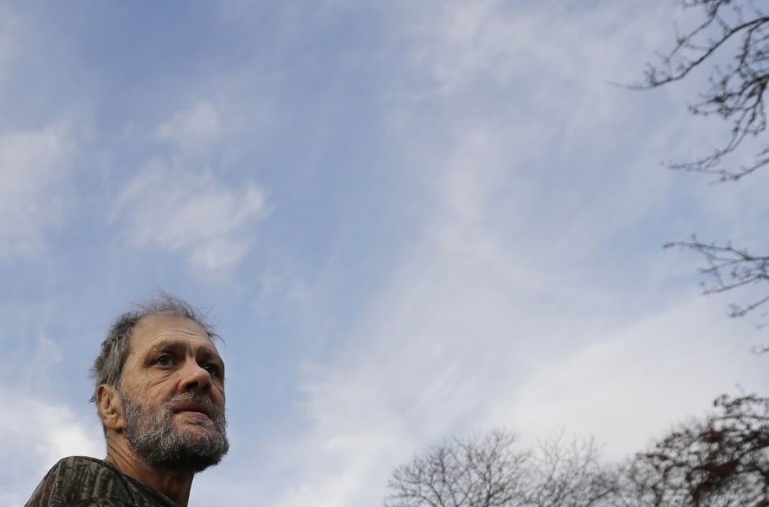 In this Friday, Dec. 20, 2019 photo, Bobby Goldberg looks to the road in front of his home in suburban Chicago. Goldberg has filed a lawsuit claiming he was abused more than 1,000 times in multiple states and countries by the late Donald McGuire, a prominent American Jesuit priest who had close ties to Mother Teresa.