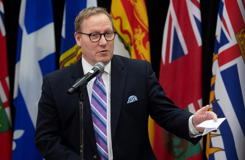 Mantiba Finance Minister Scott Fielding speaks with the media before a meeting with federal and provincial counterparts in Ottawa, Tuesday, Dec. 17, 2019. THE CANADIAN PRESS/Adrian Wyld.