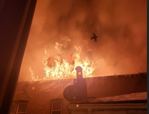Flames engulf an apartment building in the 500 block of Agnes Street early Thursday morning. 