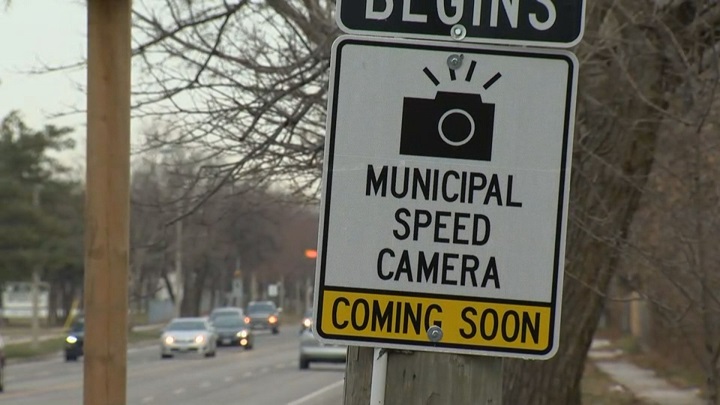 A sign announcing the pending installation of a speed camera