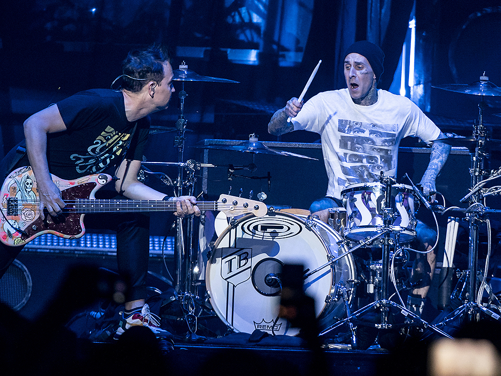 Blink-182 bass player Mark Hoppus and drummer Travis Barker perform with the band at the Xcel Energy Center. 