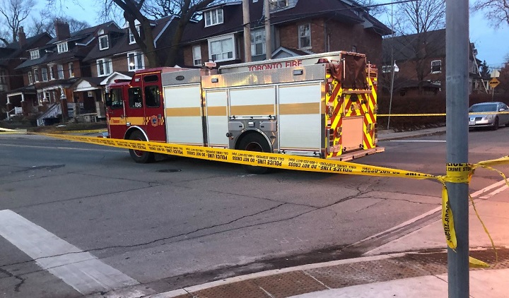 Toronto police block off a fire truck at the intersection of Oakwood and Rosemount avenues.