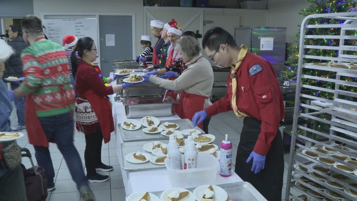 Volunteers prepare Christmas meals for those less fortunate at the Salvation Army Harbour Light in Vancouver's Downtown Eastside on Dec. 25, 2019.