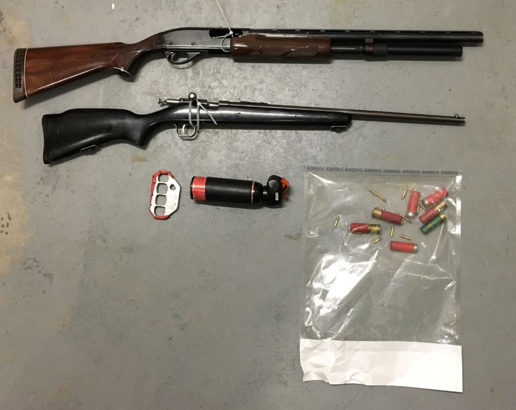 Cochrane RCMP have charged three people after seizing weapons in a vehicle search on Friday afternoon.