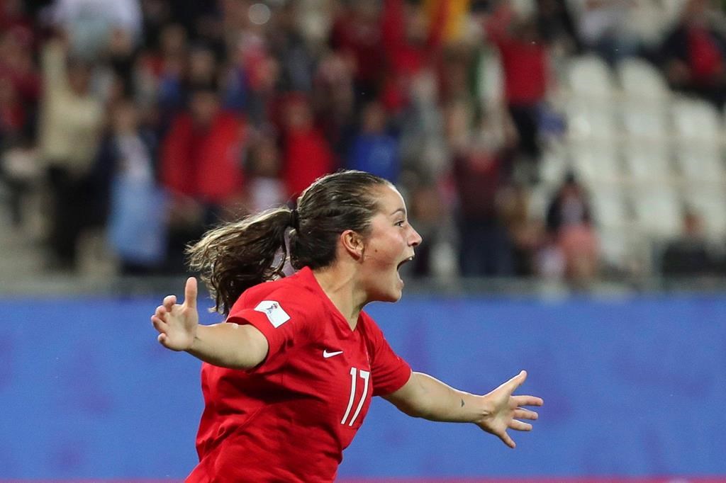 Canada's Jessie Fleming celebrates after scoring her side's opening goal during the Women's World Cup Group E soccer match between Canada and New Zealand in Grenoble, France, Saturday, June 15, 2019.