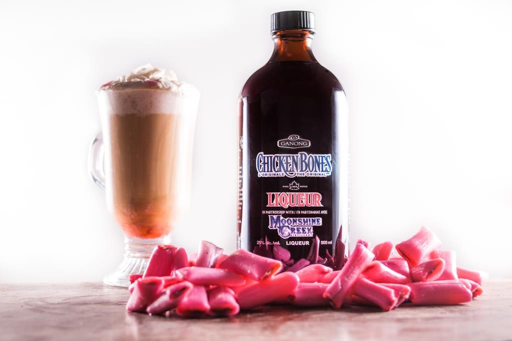 A bottle of Chicken Bones Liqueur is shown in this handout image. For generations a hard candy known as Chicken Bones has been a Christmas tradition in the Maritimes, but now a new drink that mixes the candy with liquor is in big demand this holiday season.