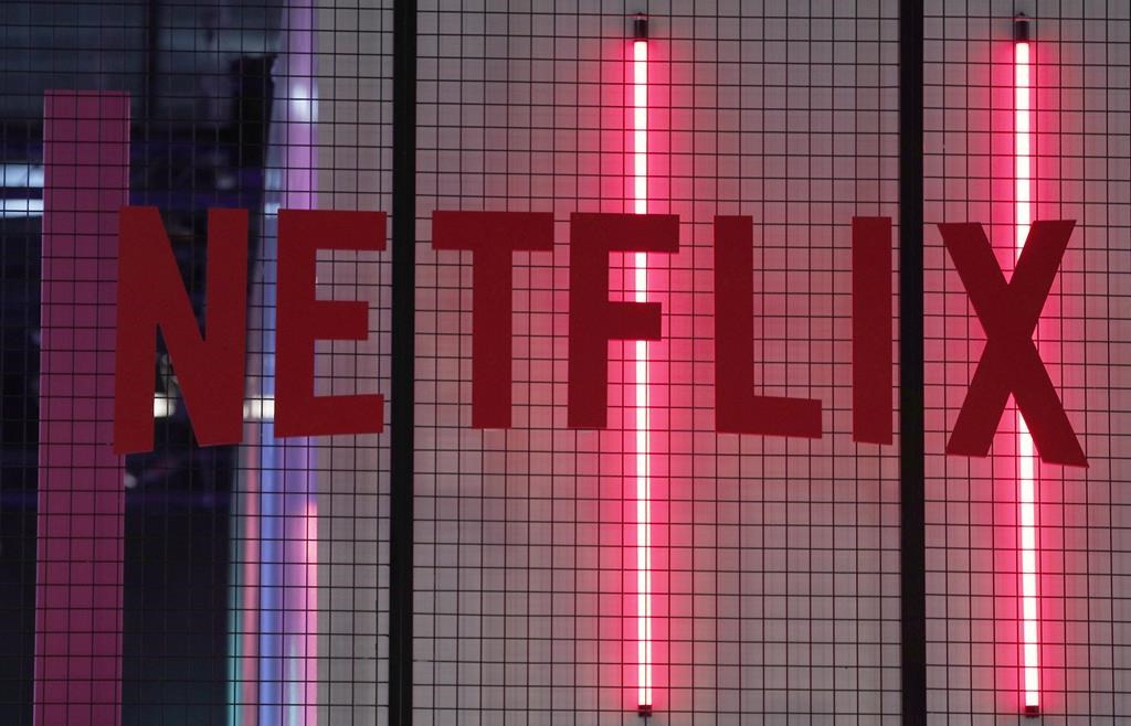 The logo of American entertainment company Netflix is pictured at the Paris games week in Paris, Saturday, Nov. 4, 2017. THE CANADIAN PRESS/AP-Christophe Ena