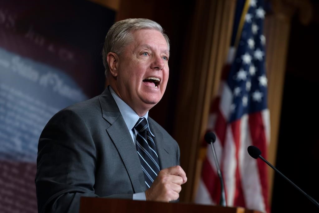 Senate Judiciary Committee Chairman Lindsey Graham, R-S.C., denounces a report by the Justice Department's internal watchdog that concluded the FBI was justified in opening its investigation into ties between the Trump presidential campaign and Russia and did not act with political bias, on Capitol Hill in Washington, Monday, Dec. 9, 2019.