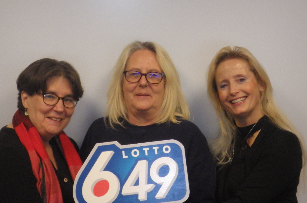 Roberta Schneider (L), Della Schneider, and Sharon Besler-Rahmoun (R) have won a $1 million prize from a Lotto 6/49 ticket sold in Leduc.