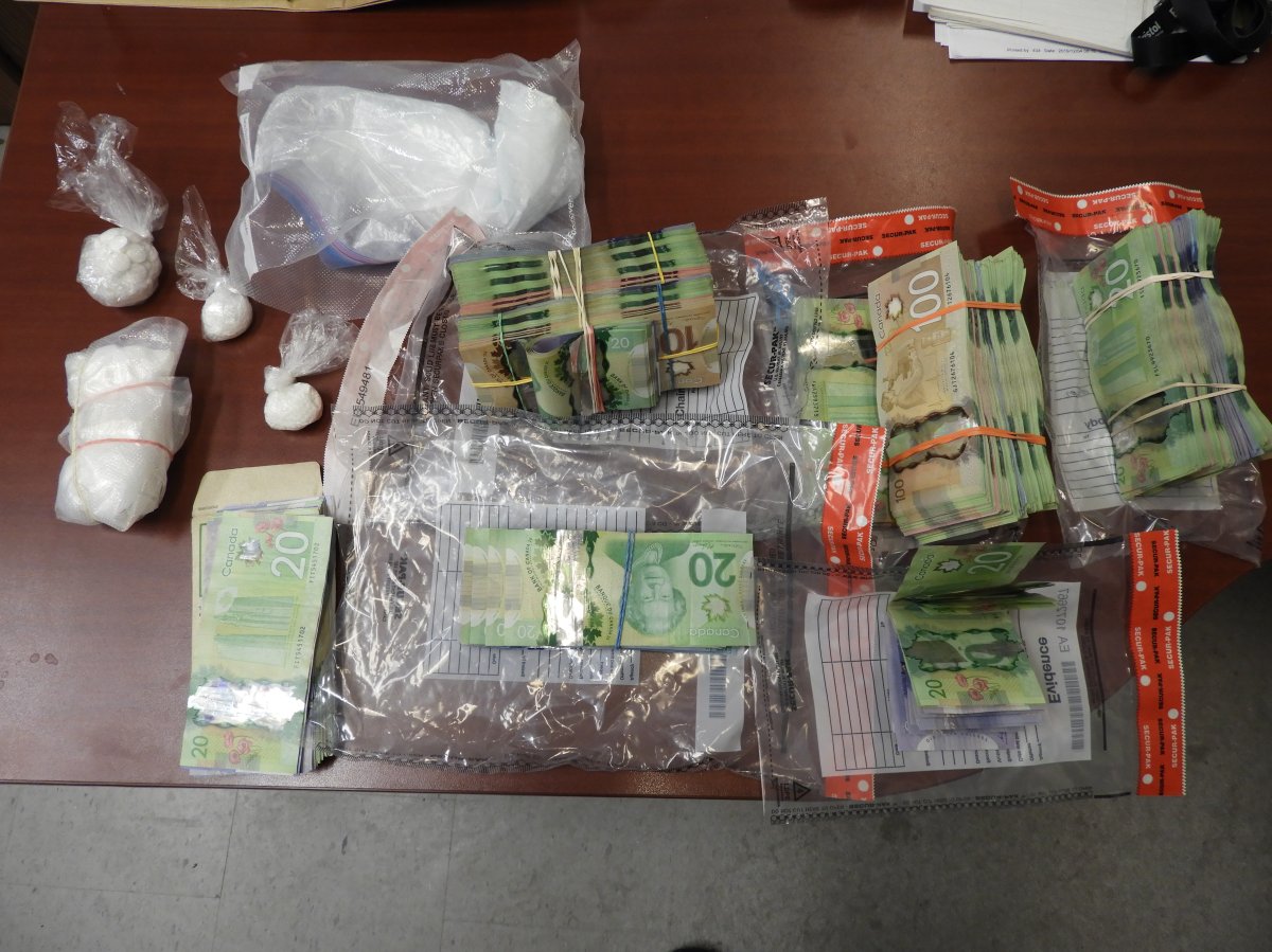 Five people were arrested after Peterborough police seized cocaine from residences in Peterborough on Tuesday.