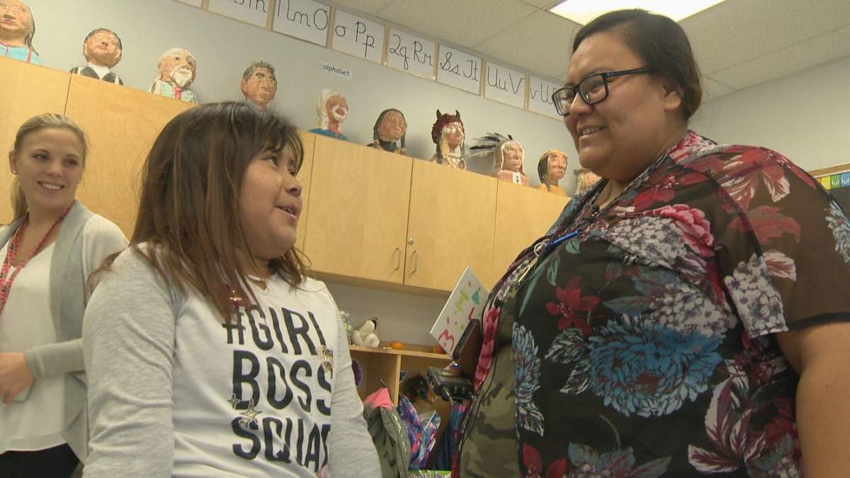 Mom and educational assistant Isabella Goodstoney worries Exshaw School is about to close.