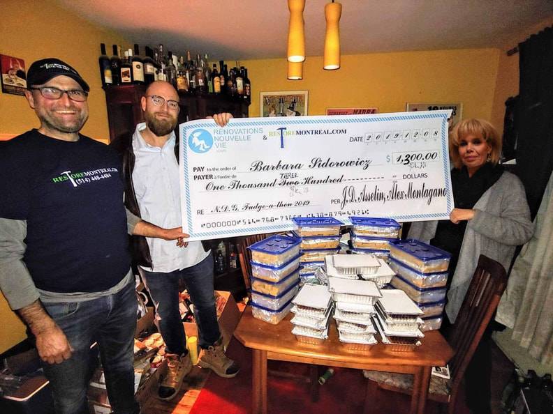 Barbara Sidorowicz is pictured with Jonathan Asselin of Rénovations Nouvelle Vie (centre) and Alex Montagano of Restore Montreal (left) after they made their donation.