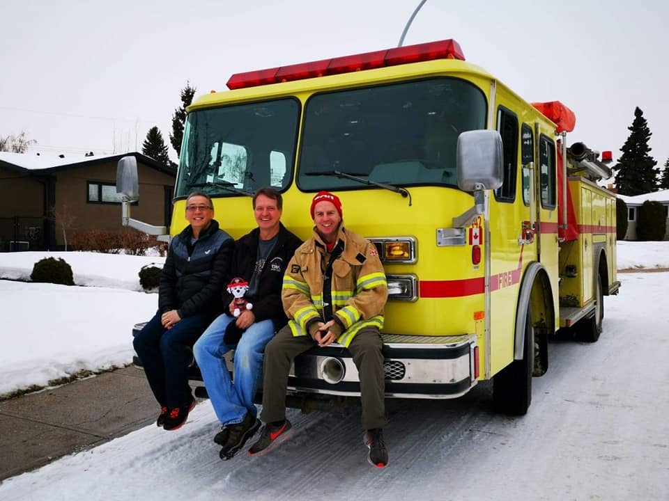 Roger Poon (L), Brad Volovich and Chris Hardeman have successfully delivered a fire truck all the way from Edmonton to Puerto Morelos, Mexico.