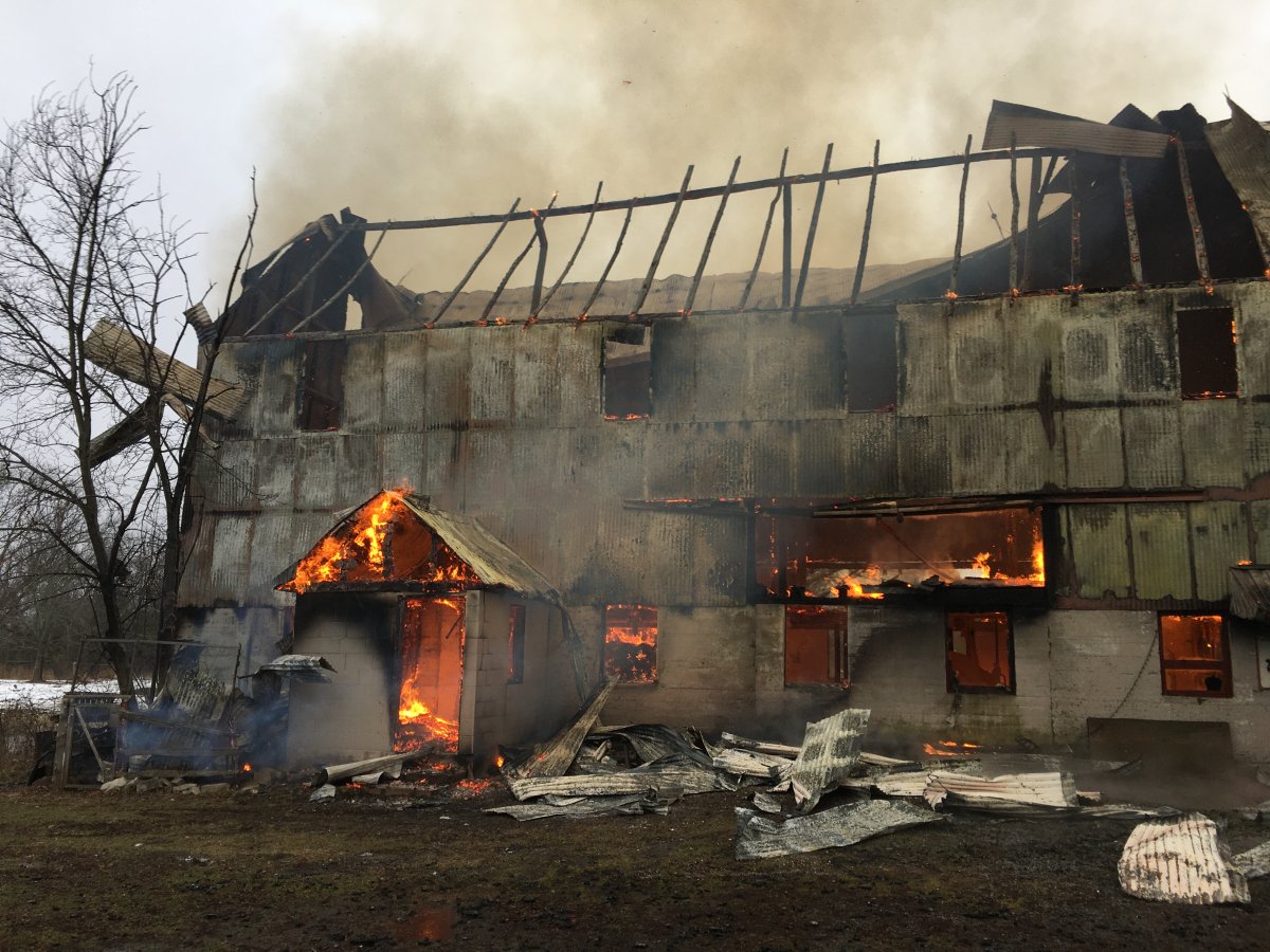 A large barn caught fire in Wilton, Ont., on Monday afternoon. Loyalist fire chief Fred Stephenson says it may take all night to put out the flames.