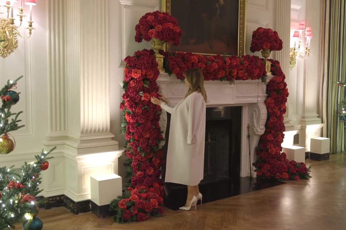 Melania Trump adjusts decorations at the White House in this image from video released on Dec. 1, 2019.