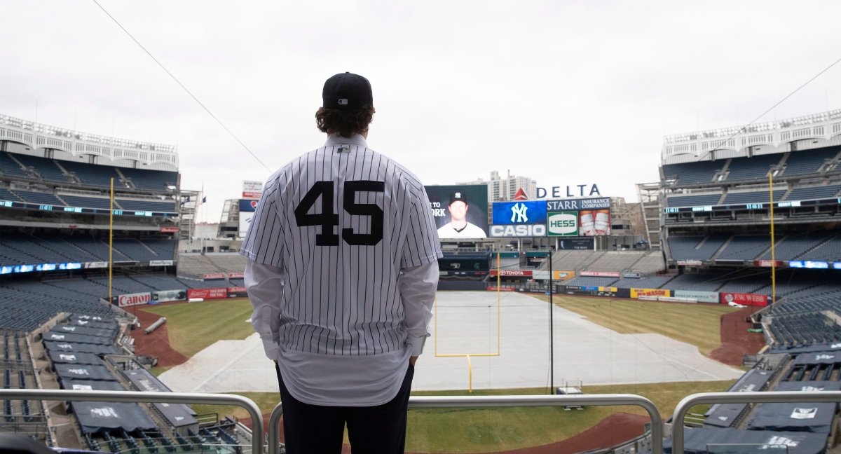 Gerrit Cole poses at Yankee Stadium as the newest New York Yankees playeron Wednesday, Dec. 18, 2019 in New York.
