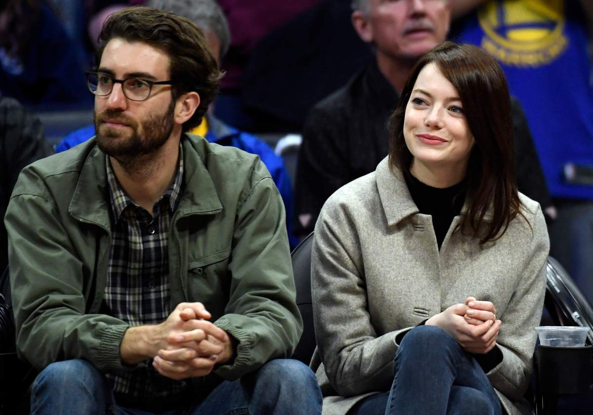 Emma Stone and Dave McCary attend the Golden State Warriors and Los Angeles Clippers basketball game at Staples Center on Jan. 18, 2019 in Los Angeles, Calif. 
