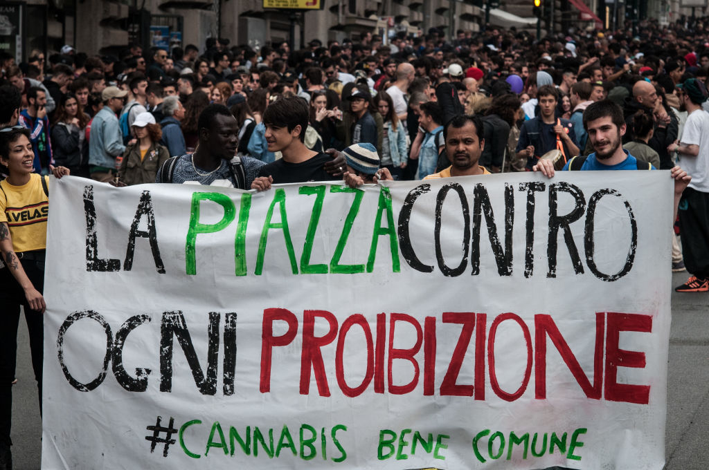 People take part in a pro-legalization demonstration in Rome in May of 2019 . 