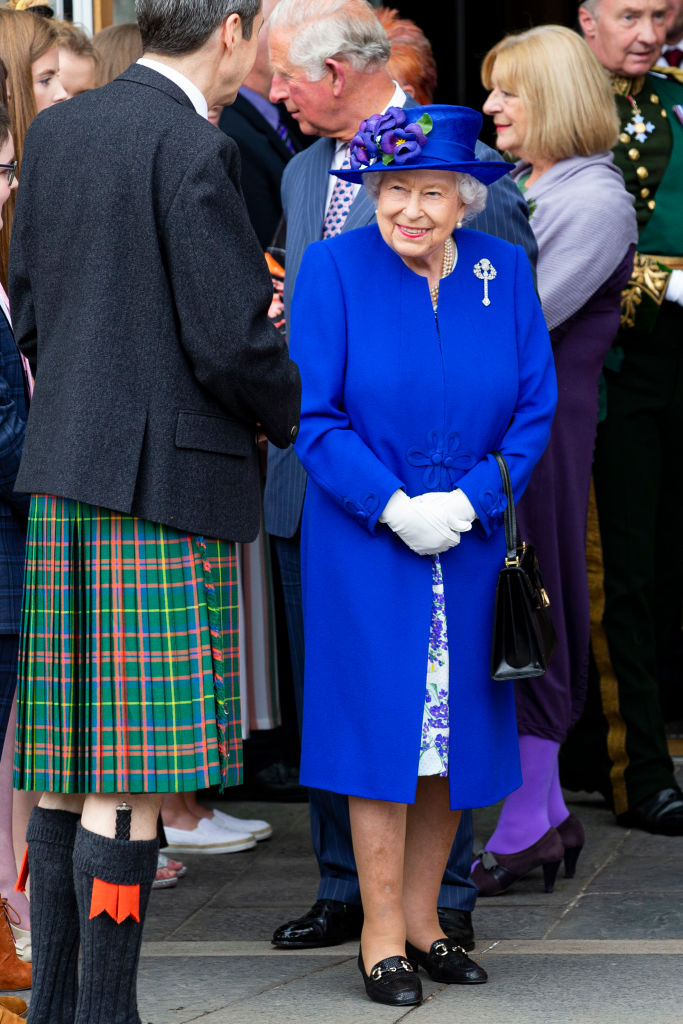 Queen Elizabeth II attends the Scottish Parliament’s 20th anniversary and is seen with Presiding Officer Ken Macintosh and meeting young Scots on June 29, 2019 in Edinburgh, Scotland. Photo: Getty Images