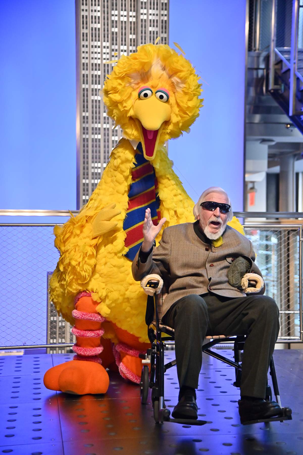 Sesame Street’s Big Bird and puppeteer Caroll Spinney light the Empire State building on Nov. 8, 2019 in New York City.