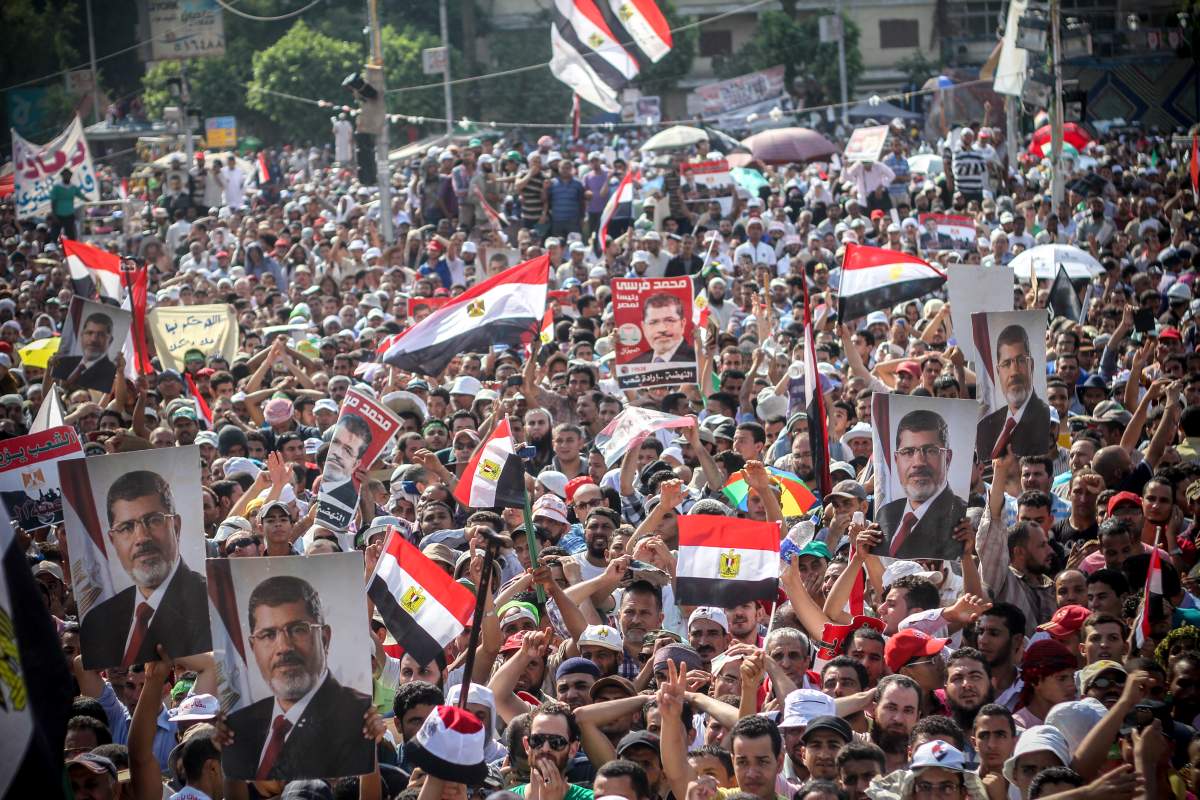 Supporters of ousted president Mohamed Morsi are seen in Rabaa Adaweya camp, where they called for his return after the military coup that ousted him on July 3, 2013.