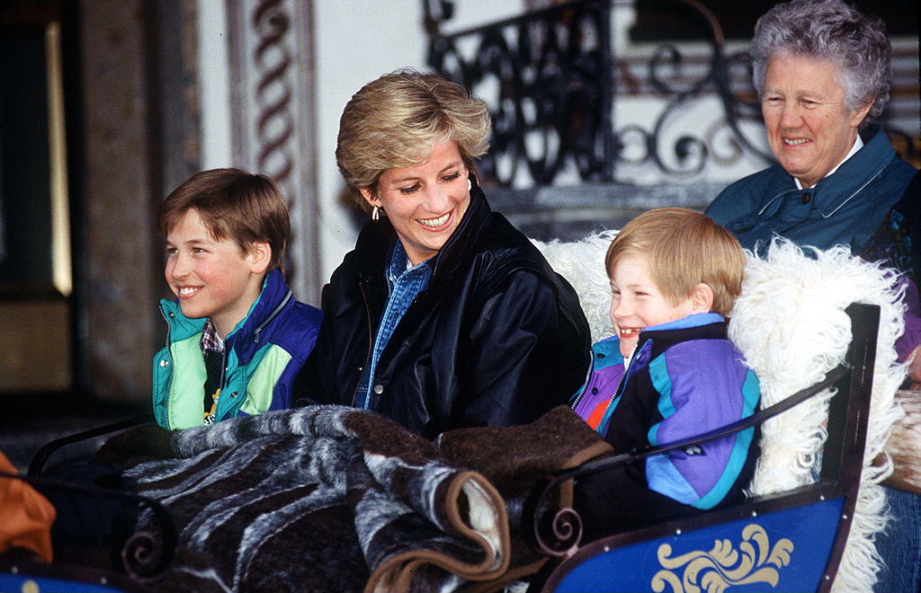 Princess Diana, Prince William, Prince Harry and their former nanny, Olga Powell, ride in a carriage in Lech, Austria, in March 1993.
