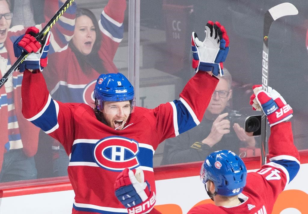 Montreal Canadiens’ Ben Chiarot (8) celebrates with teammate Joel Armia after scoring during overtime NHL hockey action against the Ottawa Senators on Dec. 11, 2019. THE CANADIAN PRESS/Graham Hughes