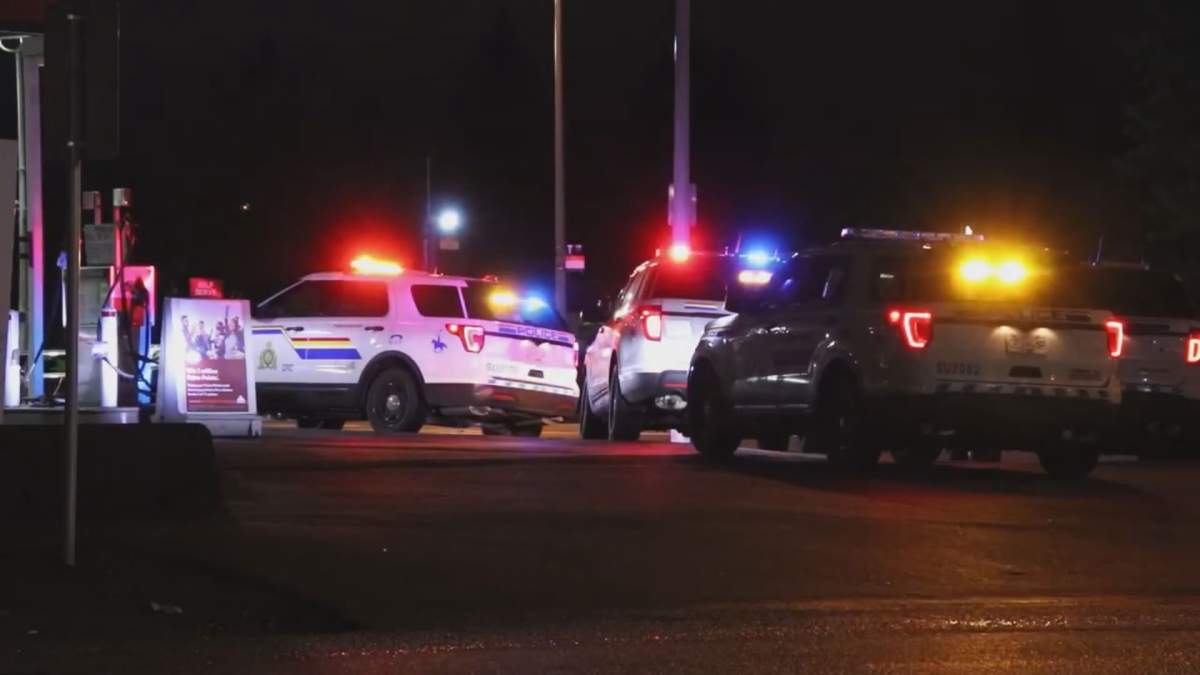 Police on the scene of a shooting in Surrey's Guildford neighbourhood on Monday night. 