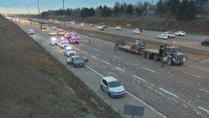 Three lanes are blocked on the northbound side of  Highway 410, with only one lane open for traffic to get by.