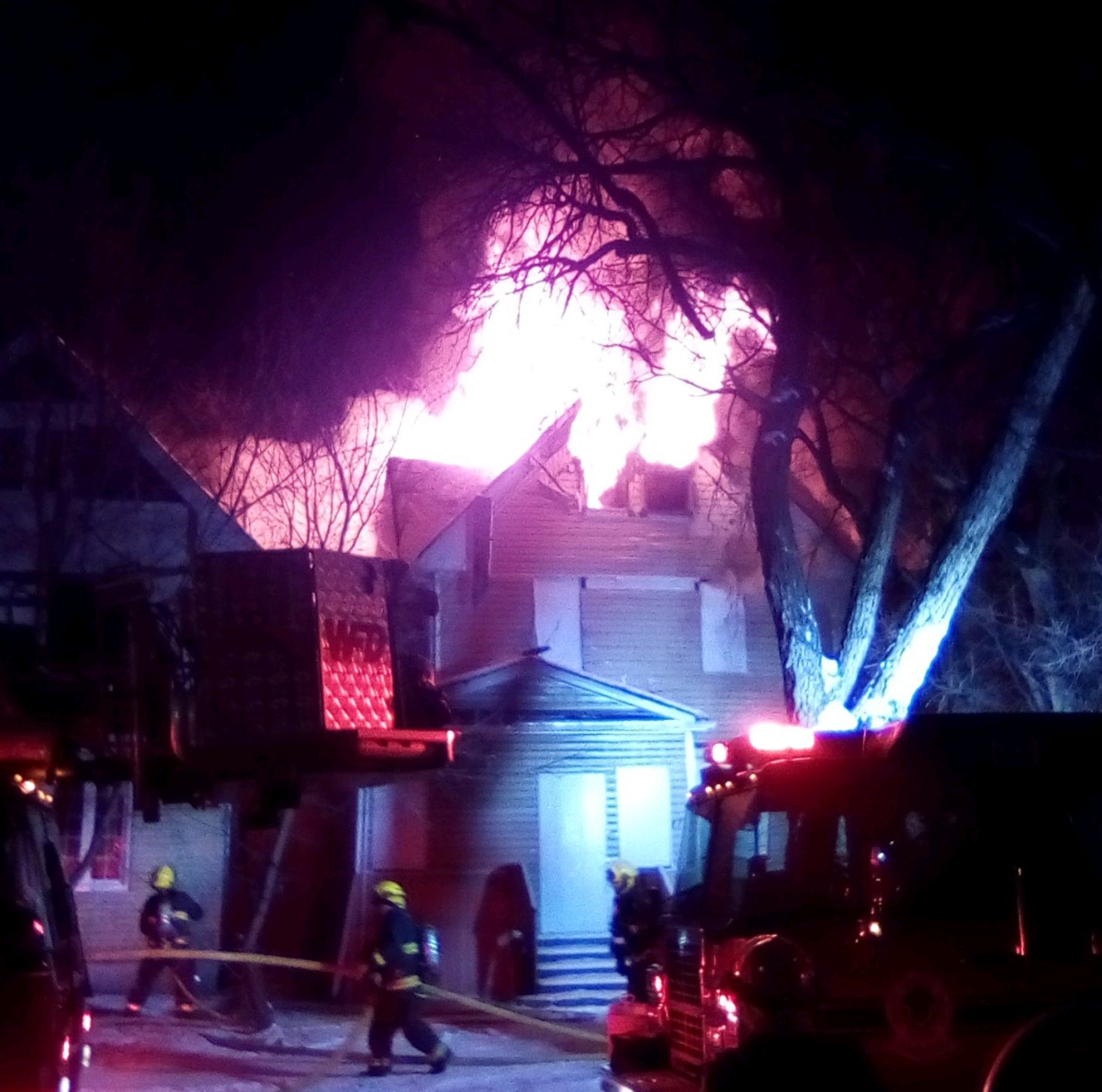 A neighbour provided this photo of a house on fire on Maryland Street Wednesday.
