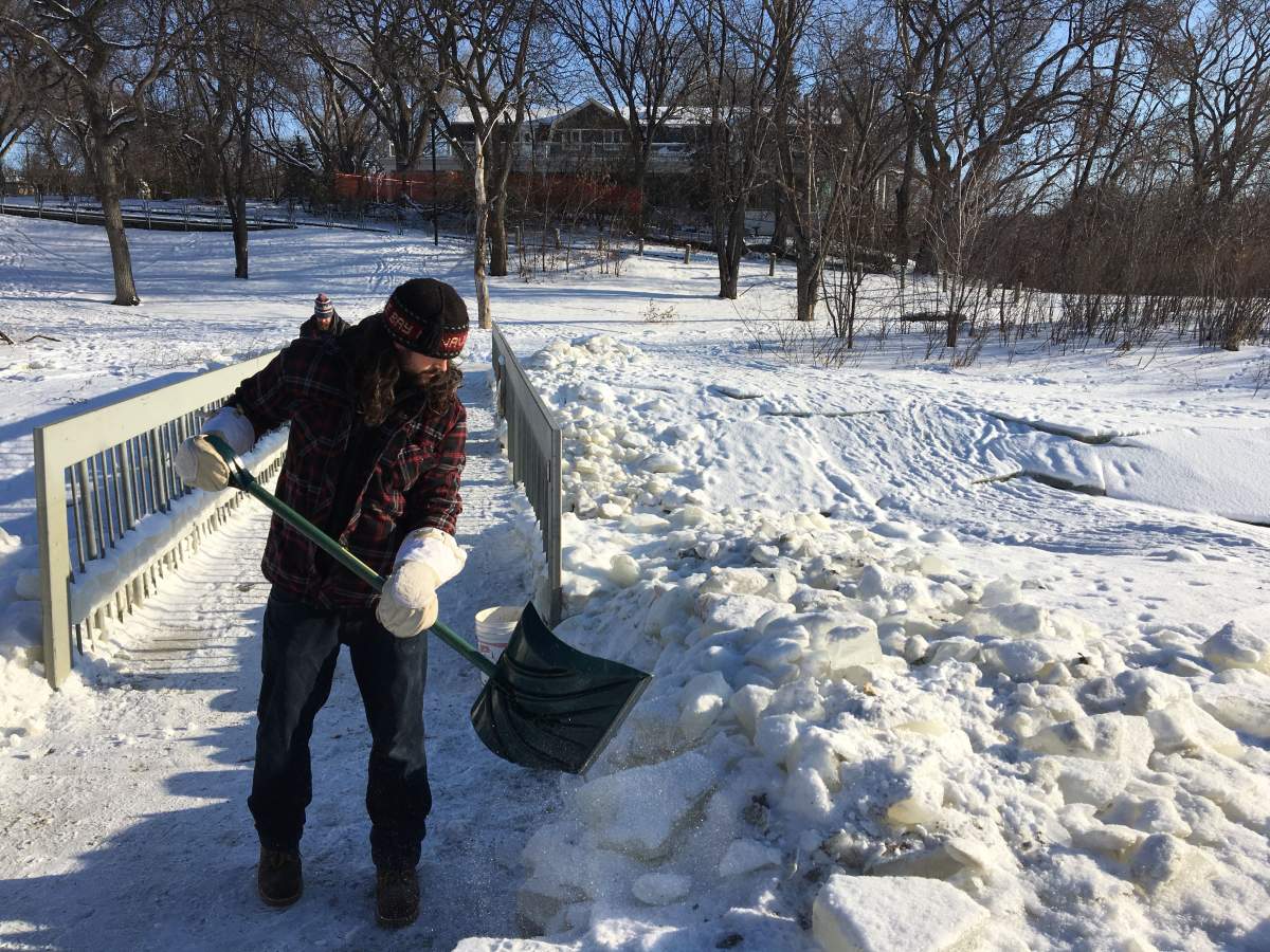 Brad Hignell helped clear the bridge of snow and ice over the weekend. Amber McGuckin/Global News
