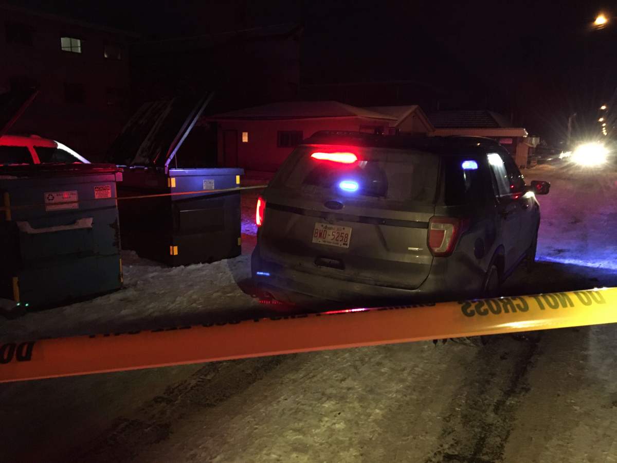 Edmonton police investigating in an alley near 118 Avenue and 84 Street in central Edmonton on Friday, Dec. 6, 2019.