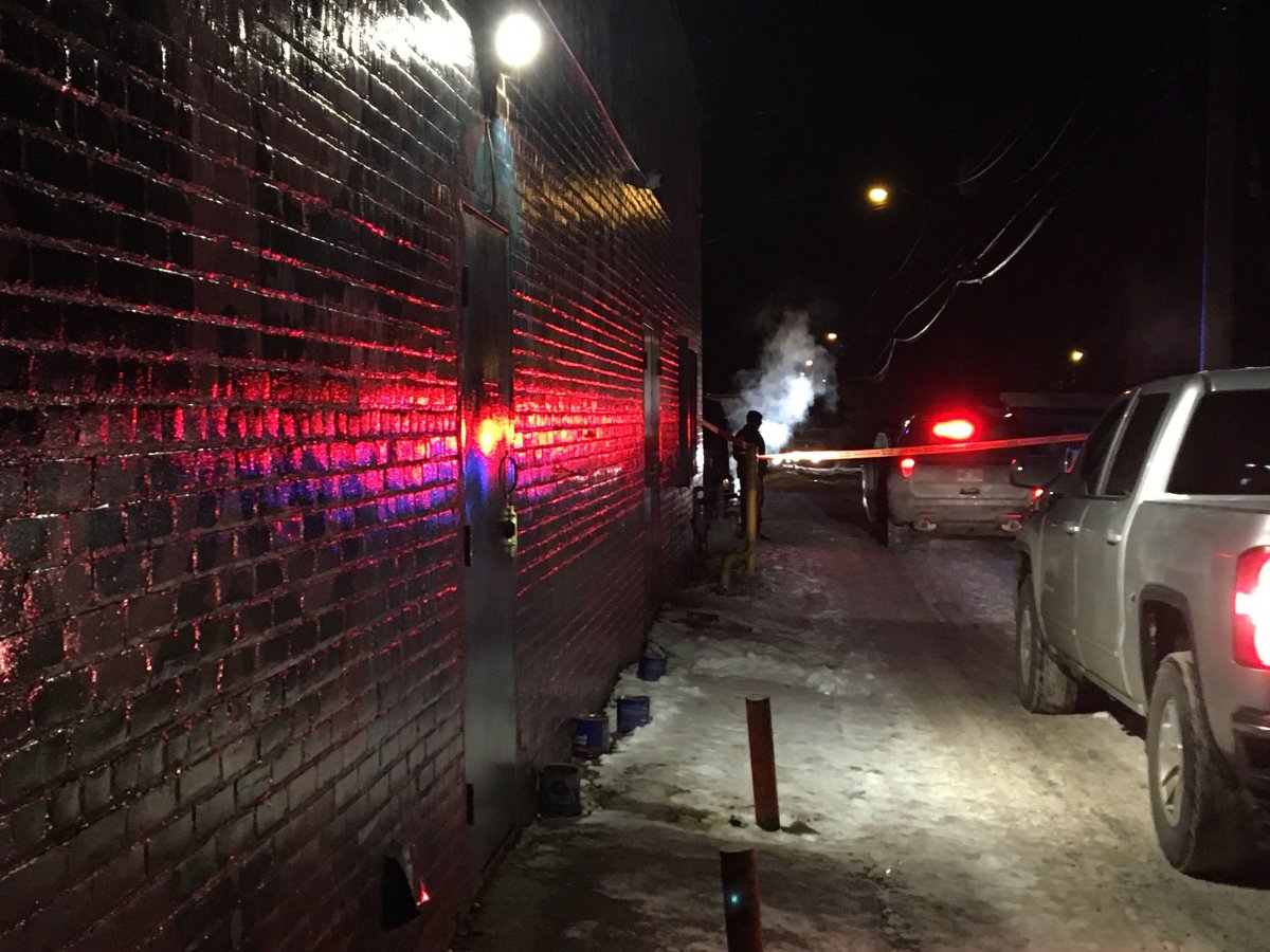 Edmonton police investigating in an alley near 118 Avenue and 84 Street in central Edmonton on Friday, Dec. 6, 2019. .