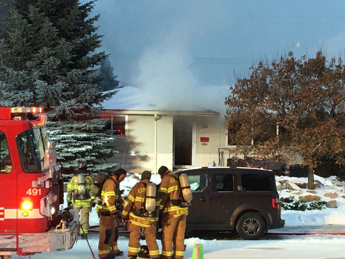Fire broke out at a home at 15405 80 Ave. in west Edmonton's Lynnwood neighbourhood. Tuesday, Dec. 10, 2019.
