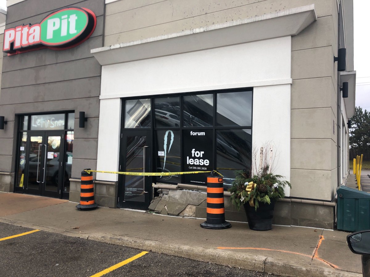 A London woman is facing charges after a vehicle struck a building on Wellington Road Sunday evening. 
