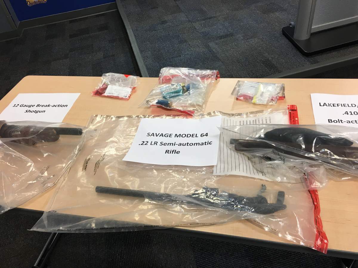 Police displayed the guns and ammunition seized over a week in November.