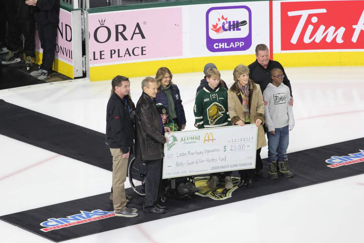 Former London National Rocky Farr makes what has become an annual donation to the London Knights Alumni Foundation in support of the London Blizzard Sledge Hockey team, the London Devilettes, the London Bandits and the George Bray Sports Association on Dec. 13, 2019.