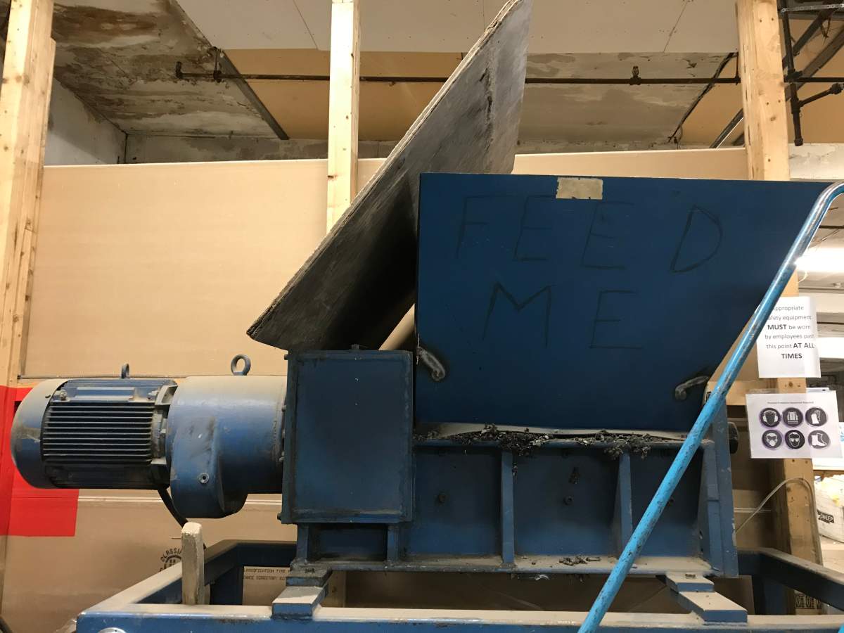 An industrial shredder can take up to 200 hard drives and break them into tiny pieces, which are recycled.