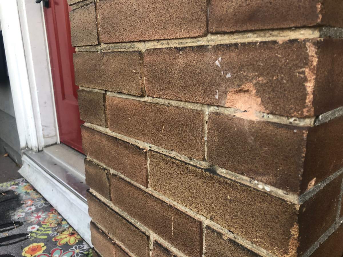 One of three pockmarks left by bullets following an Airbnb party on Saturday night.
