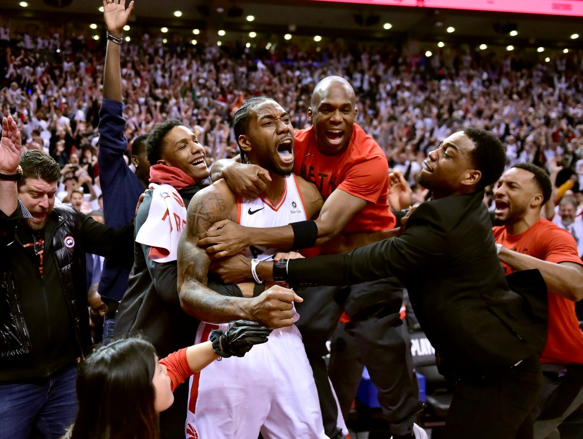 Toronto Raptors forward Kawhi Leonard (2) celebrates his game-winning buzzer beater in Game 7 of the NBA's Eastern Conference semifinal in Toronto on Sunday, May 12, 2019.